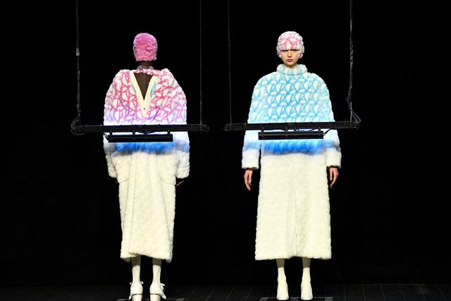 Anrealage presented outfits that change color under ultraviolet light at Paris Fashion Week